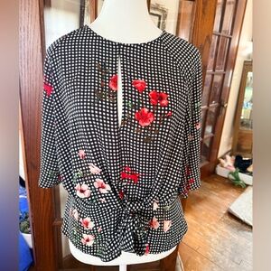 Express Black and White Checkered Blouse with Red Floral Accents